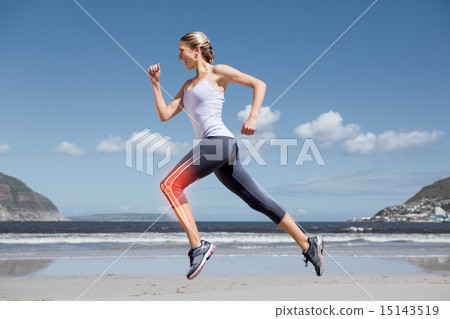 Highlighted leg bones of jogging woman on beach 15143519