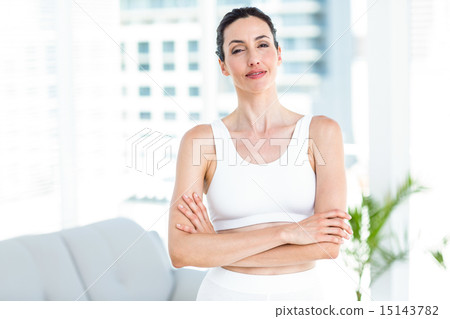 Smiling brunette wearing sportswear Smiling brunette wearing sportswear 15143782