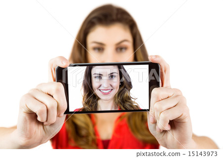 Pretty brunette taking a selfie 15143973