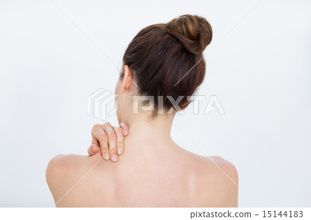 Woman touching her shoulder 15144183