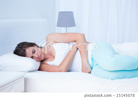 Pretty woman with stomach pain Pretty woman with stomach pain 15145078