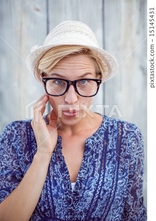 Pretty blonde woman wearing hipster glasses 15145431