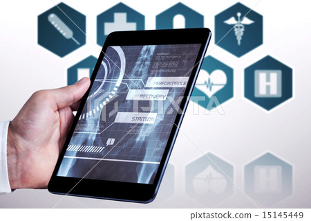 Composite image of man using tablet pc Composite image of man using tablet pc 15145449