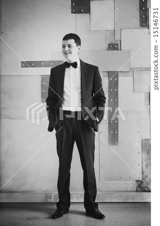 Young man in tuxedo. Black and white. 15146731