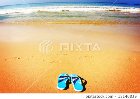 Beach sandals on tropical sandy coast 15146839