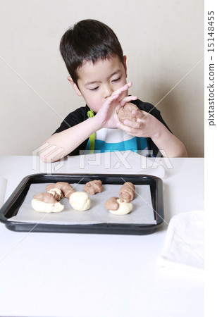 Boy making bread Boy making bread 15148455