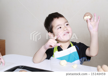 Boy making bread Boy making bread 15148459