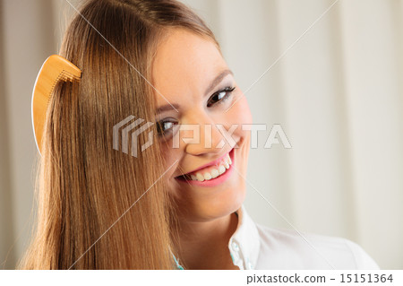 beautiful woman with long hair and comb 15151364