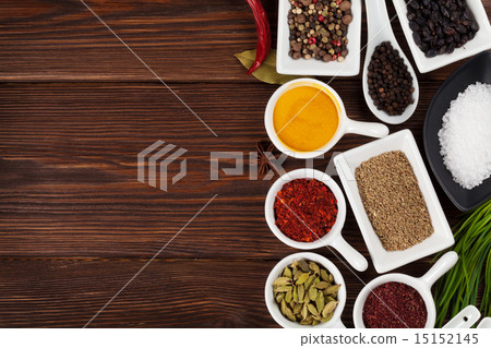 Various spices on wooden background 15152145