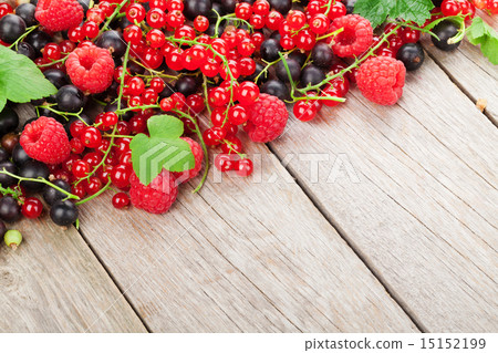 Fresh ripe berries on wooden table Fresh ripe berries on wooden table 15152199