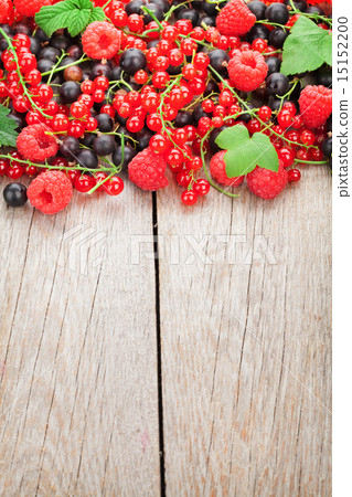 Fresh ripe berries on wooden table Fresh ripe berries on wooden table 15152200