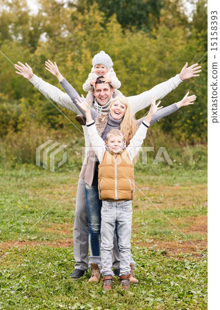 Family in the autumn park Family in the autumn park 15158393