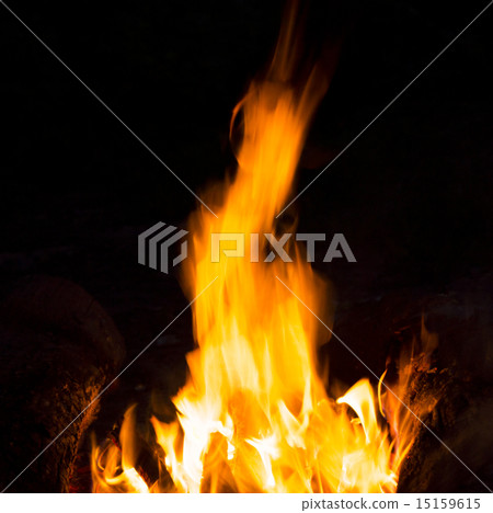 Flames of a campfire in the night 15159615