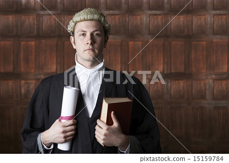 Portrait Of Lawyer In Court Holding Brief And Book 15159784