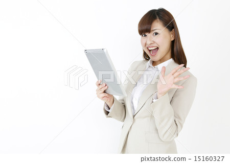 A woman watching a tablet 15160327