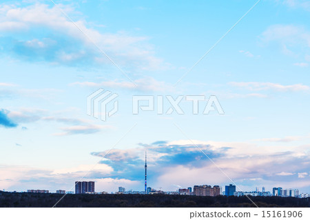 blue sunset sky over city in spring 15161906