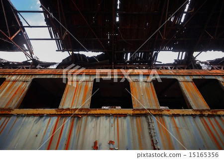 Messy vehicle interior of a train carriage 15165356