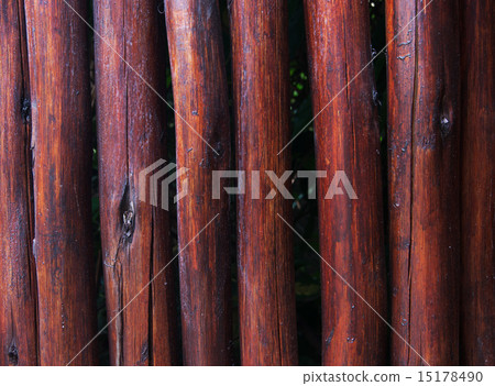 brown wooden fence round planks background 15178490