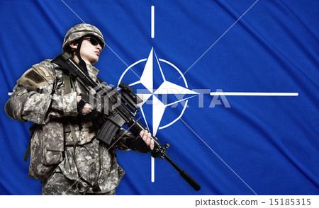soldier on NATO flag background 15185315