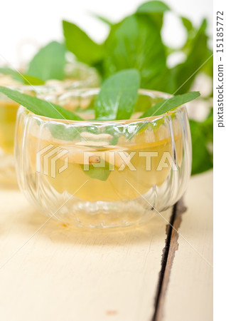 Arab traditional mint and pine nuts tea Arab traditional mint and pine nuts tea 15185772