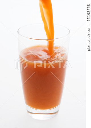 Vegetable juice pouring into a glass 15192768