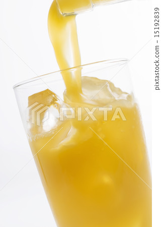 Orange juice pouring into the glass 15192839