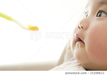 Baby eating baby food Baby eating baby food 15206611