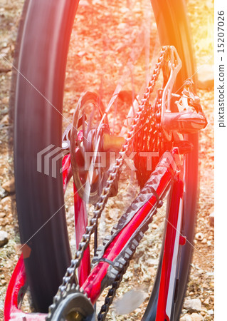 Speed concept. Fragment of bicycle wheel with a sun beam. Wheel  15207026