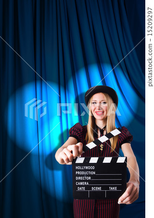 Woman gangster with movie clapper Woman gangster with movie clapper 15209297
