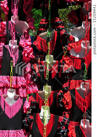 typical flamenco dresses on sale in street market 15209441