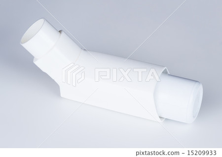 Asthma inhaler on a gray background with copy space Asthma inhaler on a gray background with copy space 15209933