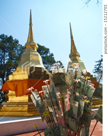 pair of  golden pagodas in Chiang Rai in Thailand 15212705