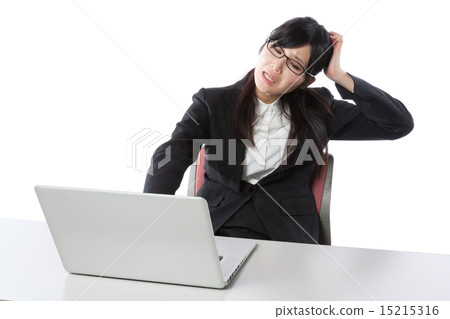 A business woman working in a laptop computer A business woman working in a laptop computer 15215316
