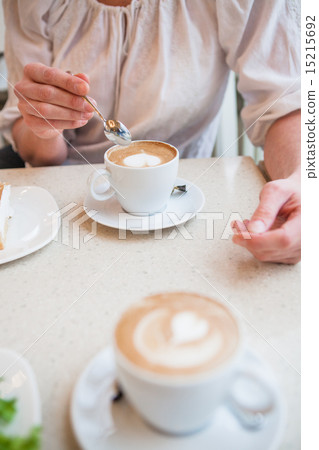 Cups of delicious coffee 15215692