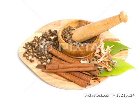 Mortar and pestle with dry herb 15216124