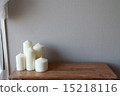 Candle on antique shelf 15218116