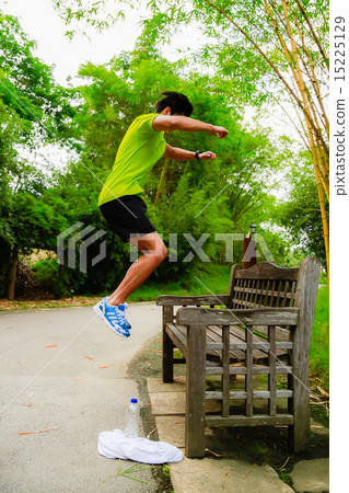 Guy working out in the park Guy working out in the park 15225129