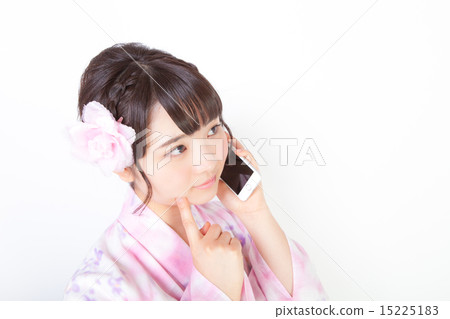 A woman in a yukata robe calling A woman in a yukata robe calling 15225183