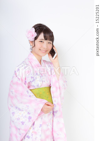 A woman in a yukata robe calling 15225201