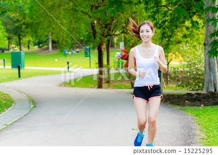 Girl working out in the singapore park Girl working out in the singapore park 15225295