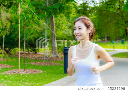 Girl working out in the singapore park Girl working out in the singapore park 15225296