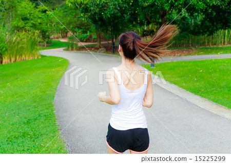Girl working out in the singapore park Girl working out in the singapore park 15225299