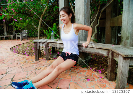 Girl working out in the singapore park Girl working out in the singapore park 15225307