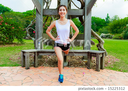 Girl working out in the singapore park Girl working out in the singapore park 15225312