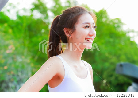 Girl working out in the singapore park Girl working out in the singapore park 15225315