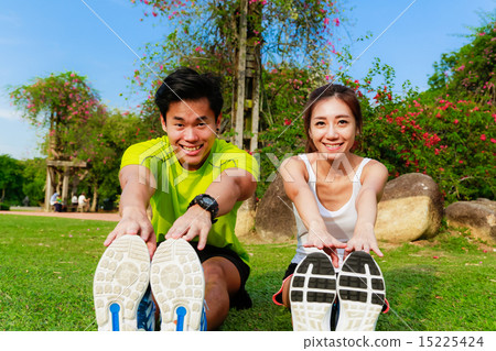 Couple Working out in the Singapore Park Couple Working out in the Singapore Park 15225424