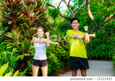 Couple Working out in the Singapore Park Couple Working out in the Singapore Park 15225425