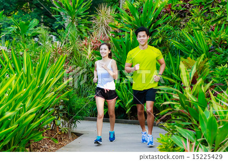 Couple Working out in the Singapore Park 15225429