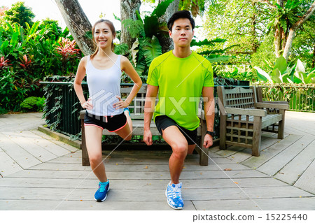 Couple Working out in the Singapore Park Couple Working out in the Singapore Park 15225440