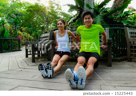 Couple Working out in the Singapore Park Couple Working out in the Singapore Park 15225443